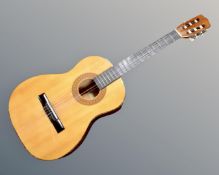 A Hohner HC-01 classical guitar.