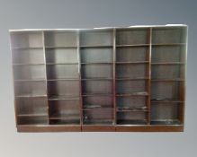 A Scandinavian three section bookcase in a mahogany finish