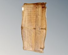 A 6' beech and bergere bed frame