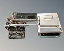 A vintage Remington typewriter together with a vintage Gross cash register.