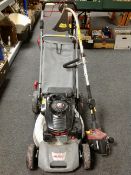 An Ikra selft drive petrol lawn mower powdered by Turino Lamborgini Technology and a Homelite