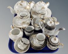 A tray containing two Japanese export coffee sets.