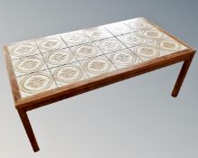 A mid 20th century Danish rosewood tiled topped coffee table