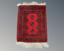 A small Afghan Bokhara hearth rug,
