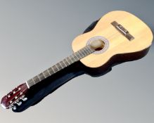 A Jose Ferrer classical guitar in carry bag.