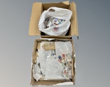 Two boxes of a large quantity of loose stamps
