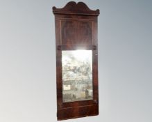 A continental inlaid mahogany wall mirror.