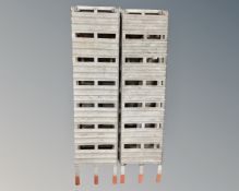 A pair of folding metal car ramps