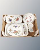 A group of Royal Worcester Evesham china including milk jug, sugar basin, serving plates etc.