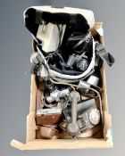 A box containing a quantity of vintage cameras including Zenit,