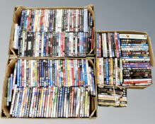 Three boxes containing assorted DVDs including children's movies etc.
