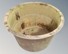A heavy cast metal agricultural pot,