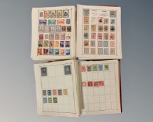 The Woldwide Stamp Album (Volume 1) containing a collection of world stamps,