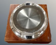 A vintage silver plated wedding cake stand in teak box