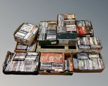 A pallet containing 10 boxes of DVDs including westerns, comedies, children's movies, box sets etc.