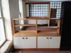 A pine two tone modular shelving unit