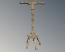 An antique pine poss stick