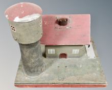 A 20th century vintage electric model of a farmhouse with silo