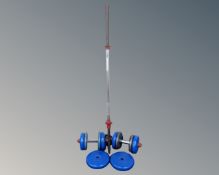 A weights bar and weights together with two dumb bell sets