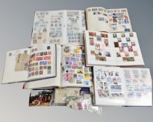 A box of six albums of 20th century antique and later world stamps and further bag of stamps
