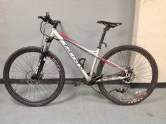 A Carrera Hellcat front suspension mountain bike