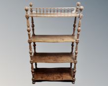 A 19th century serpentine fronted four tier what not stand