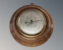 A Short and Mason early 20th century oak Stormo guide