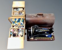 A vintage Singer sewing machine (converted) in case together with sewing box and contents