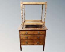 An Edwardian oak three drawer chest together with a barley twist two tier trolley