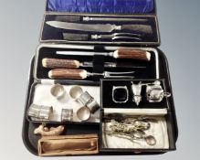 A collection of silver plated items, napkin rings, cutlery,