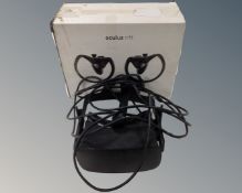 Two Oculus Rift touch controllers and head set