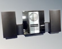 A Bang & Olufsen stereo system (door missing)