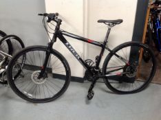 A Trek 7500 front suspension hybrid bike