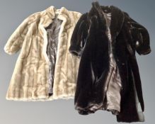Two faux fur coats,