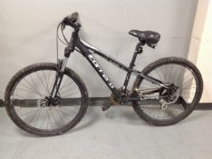 A Carrera Vengeance front suspension lady's bike