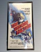 A vintage film poster 'The Trygon Factor' in frame