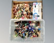 Two crates of assorted action figures, Lego and other plastic building blocks,