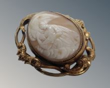 A gilt metal cameo brooch