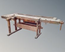 An early 20th century joiner's workbench fitted with two vice