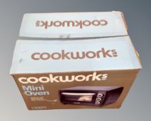 A Cookworks mini oven, boxed.