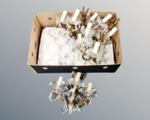 A quantity of gilt metal and crystal wall lights