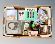 A box of Mixx wireless ear buds, Asda blu-tooth headphones, pocket pop super heroes,