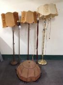 Five Scandinavian brass and metal uplighters