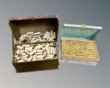 Two church boxes containing bible verses on rolls of paper.