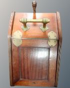 A late Victorian mahogany brass mounted coal receiver with shovel.