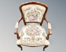A continental carved beech framed salon armchair