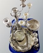 A tray of silver plated wares, swing handled basket, a pair of candelabrum.