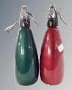 A pair of mid-20th century soda siphons.