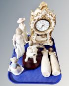 A Juliannia collection decorative gilded clock together with three Nao figures,