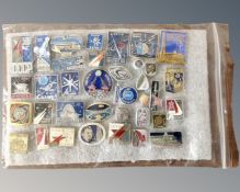 A collection of space program pin badges made in the USSR.